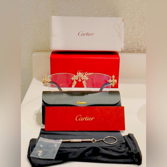 Cartier Other - Cartier Clear Cross Sunglasses